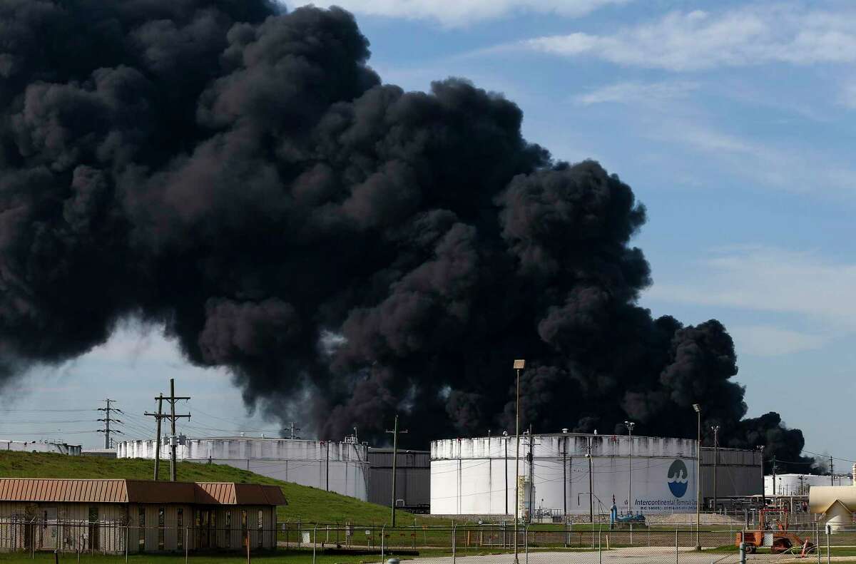 Firefighters battle to extinguish a petrochemical fire at intercontinental Terminals Company Monday, March 18, 2019, in Deer Park, Texas. The fire started Sunday and grew from two to eight tanks overnight.