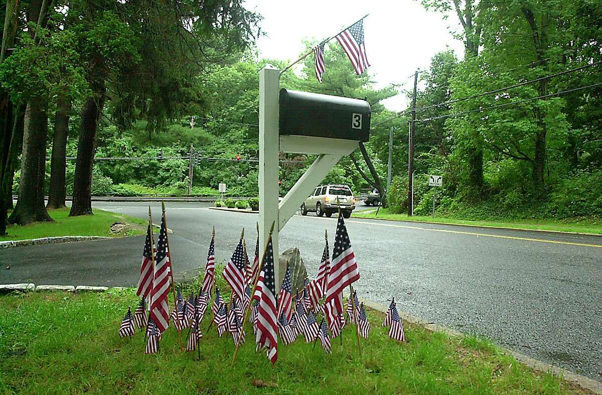Greenwich 14 Sep 2001 - American flags surround a mailbox on Hillside Road. Photo/Mel Greer COLOR