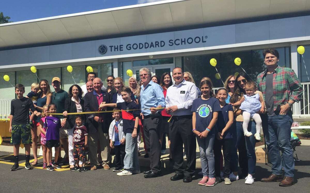 Cutting the ribbon at The Goddard School.