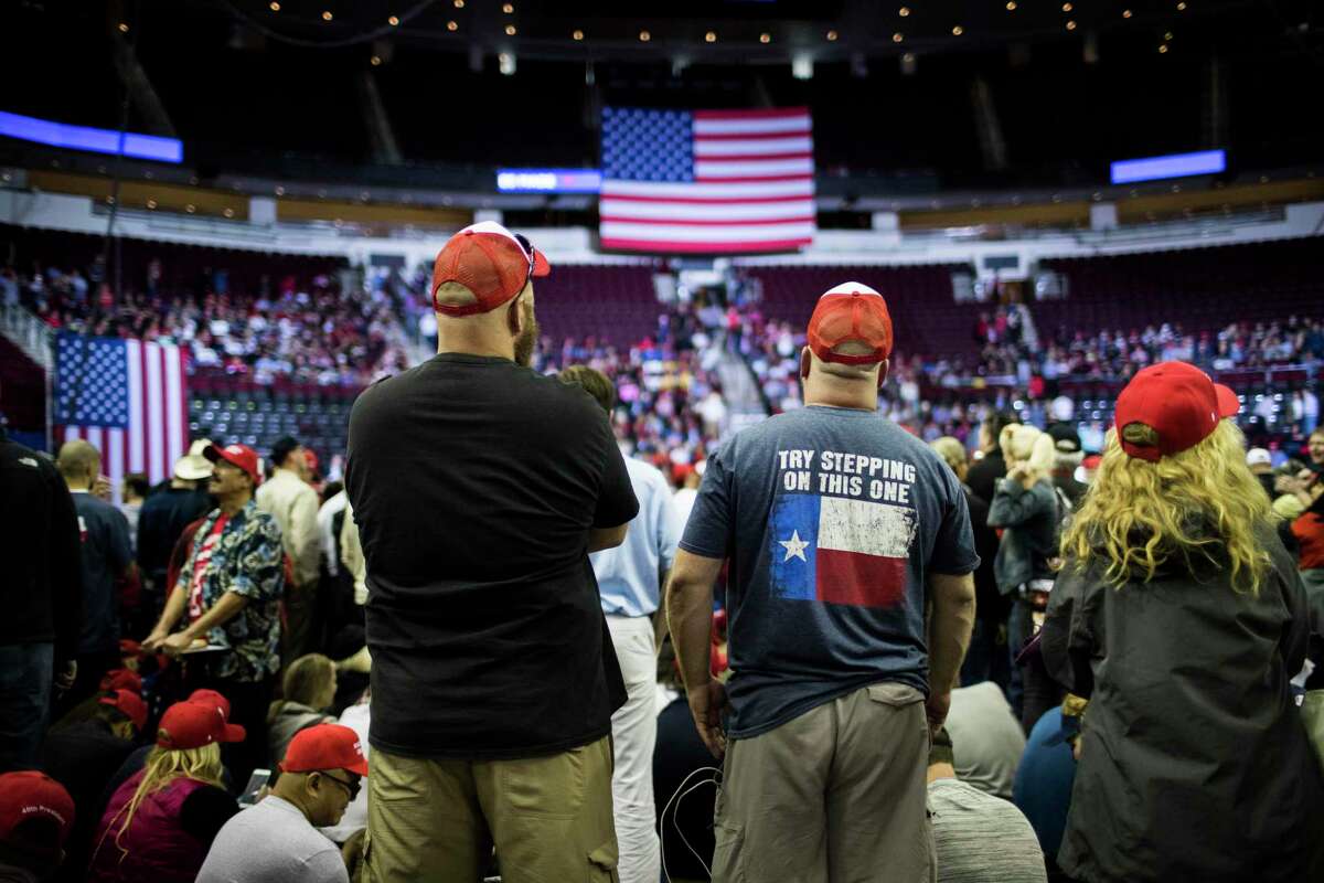 President Donald Trump supporters wait for the rally to start with the speeches at the Toyota Center, Monday, Oct. 22, 2018, in Houston.