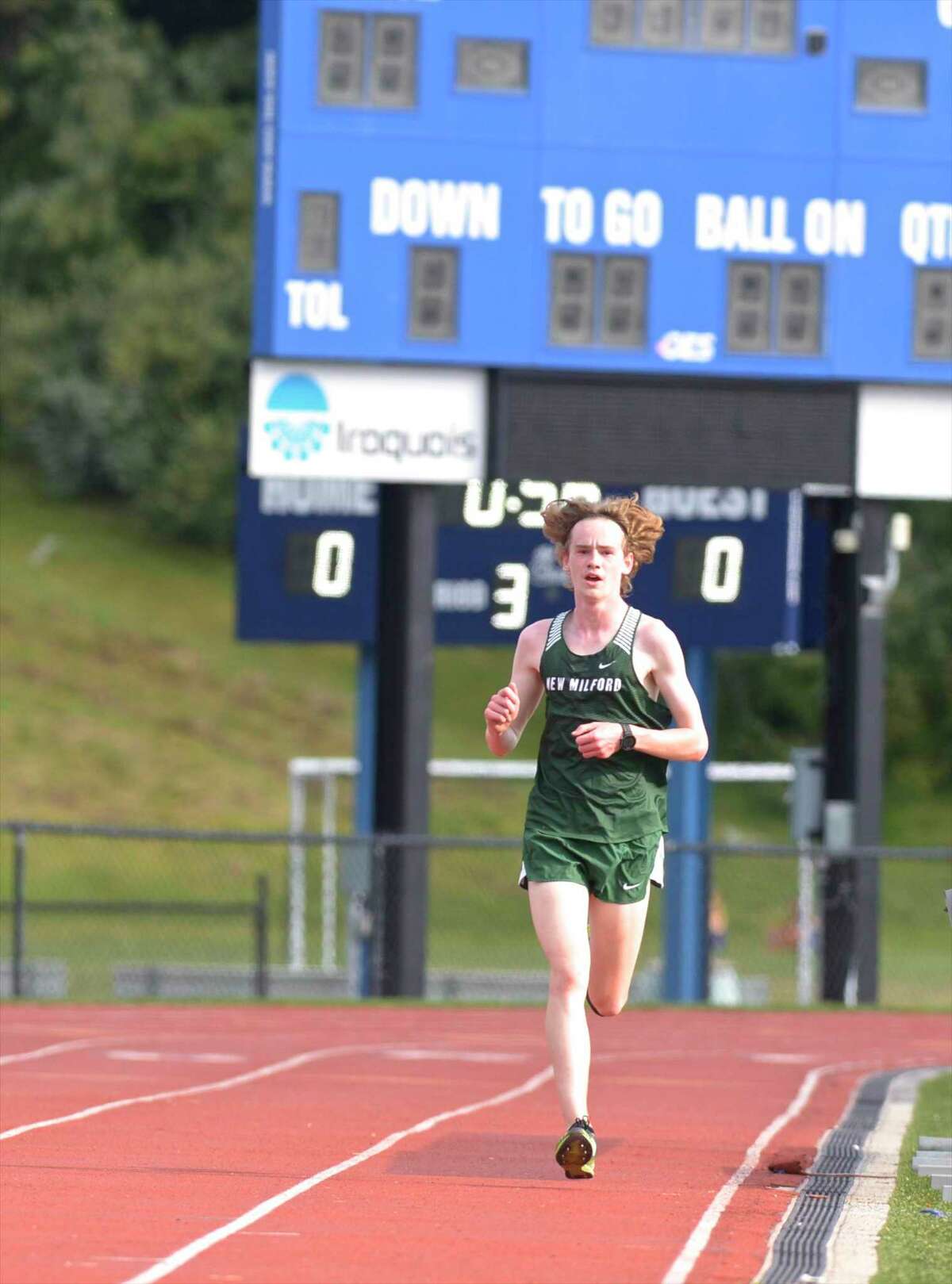 New Milford's Garred Farrell took first in the boys Cross Country meet between Bethel, New Milford and Brookfield high schools, Tuesday, September 10, 2019, at Brookfield High School, Brookfield, Conn.