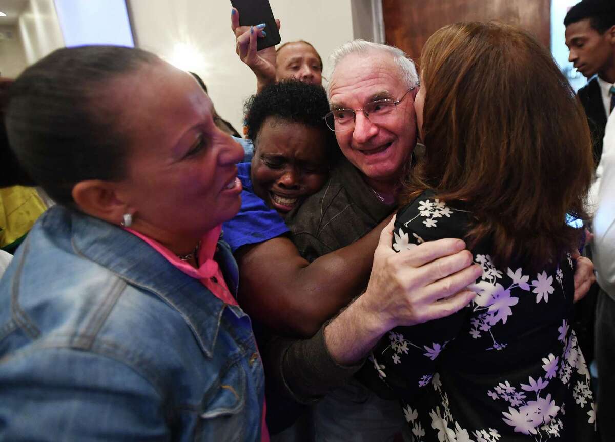 Bridgeport Democratic Town Committee Chairman Mario Testa is hugged by Ganim supporters following the announcement of Ganim's victory in the Bridgeport Democratic mayoral primary at Testo's Restaurant in Bridgeport, Conn. on Tuesday, September 10, 2019.