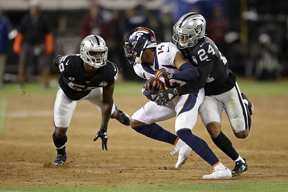 Courtland Sutton, Denver Broncos receiver, is eliminated by Oakland Raiders defensive back Johnathan Abram (24) in the second half of an NFL football game on Monday, September 9, 2019, in Oakland , in California. Left, Raiders linebacker, Tahir Whitehead. (AP Photo / Ben Margot) Photo: Ben Margot / Associated Press