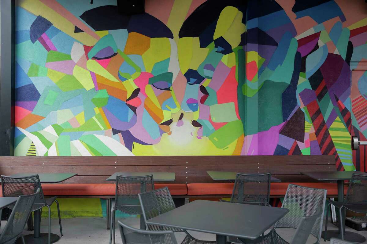 A mural in the outside patio at Postino WineCafe's second Houston location on Tuesday, Sept. 10, 2019 in Houston. The restaurant and wine shop will open next week in Montrose, the former home of the Montrose Mining Company, Houston's longest-running gay bar. Postino's owner has created a preservation-minded design that pays homage to the spirit of the neighborhood.