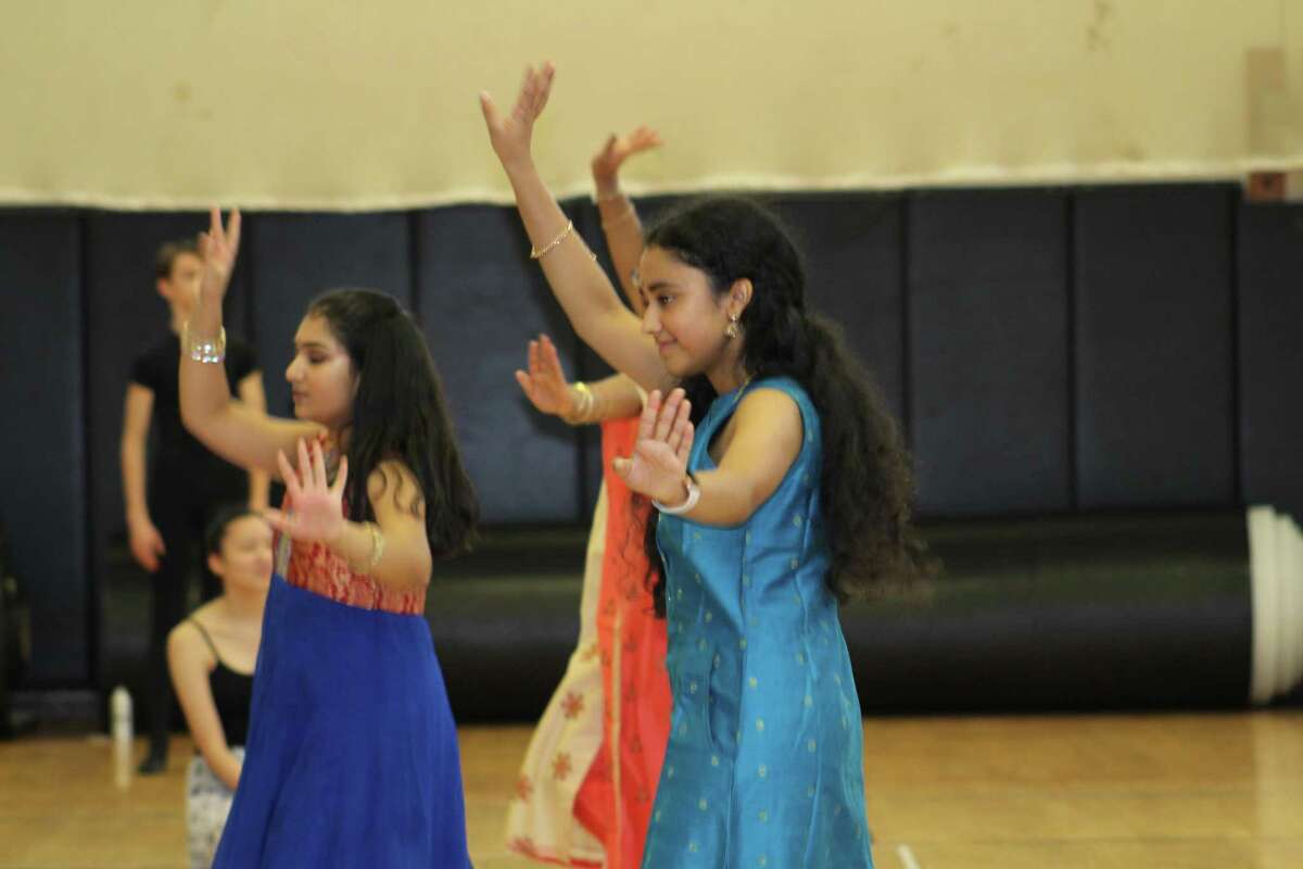 Student dancers in anarkali dresses on dance day during Trumbull High School's World Language Week.