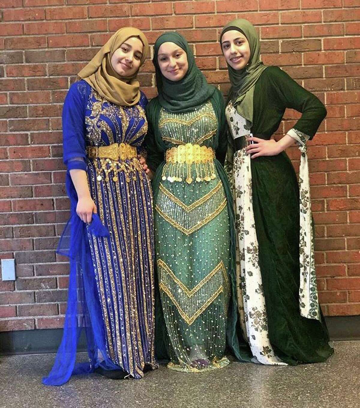 Trumbull High students wear traditional Kurdish dress as part of World Language Week.