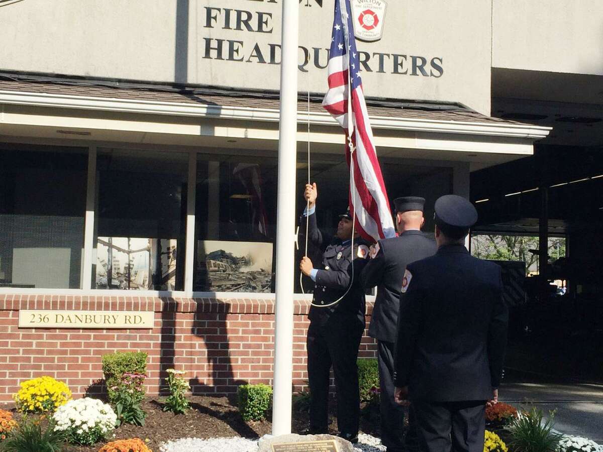 Flags were lowered to half-staff in Wilton to honor victims of a mass shooting in Indianapolis on Friday, April 16. Picture taken Sept. 11, 2019.
