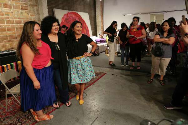 Cristina Martinez of “Very That,” from left; Kathy Cano-Murillo of “The Crafty Chica”; and Melanie Mendez-Gonzales of “Que Means What” pose for a group photo at Brick in the Blue Star Arts Complex. More than 125 people came to an event to hear Cano-Murillo and shop from more than a dozen local vendors.