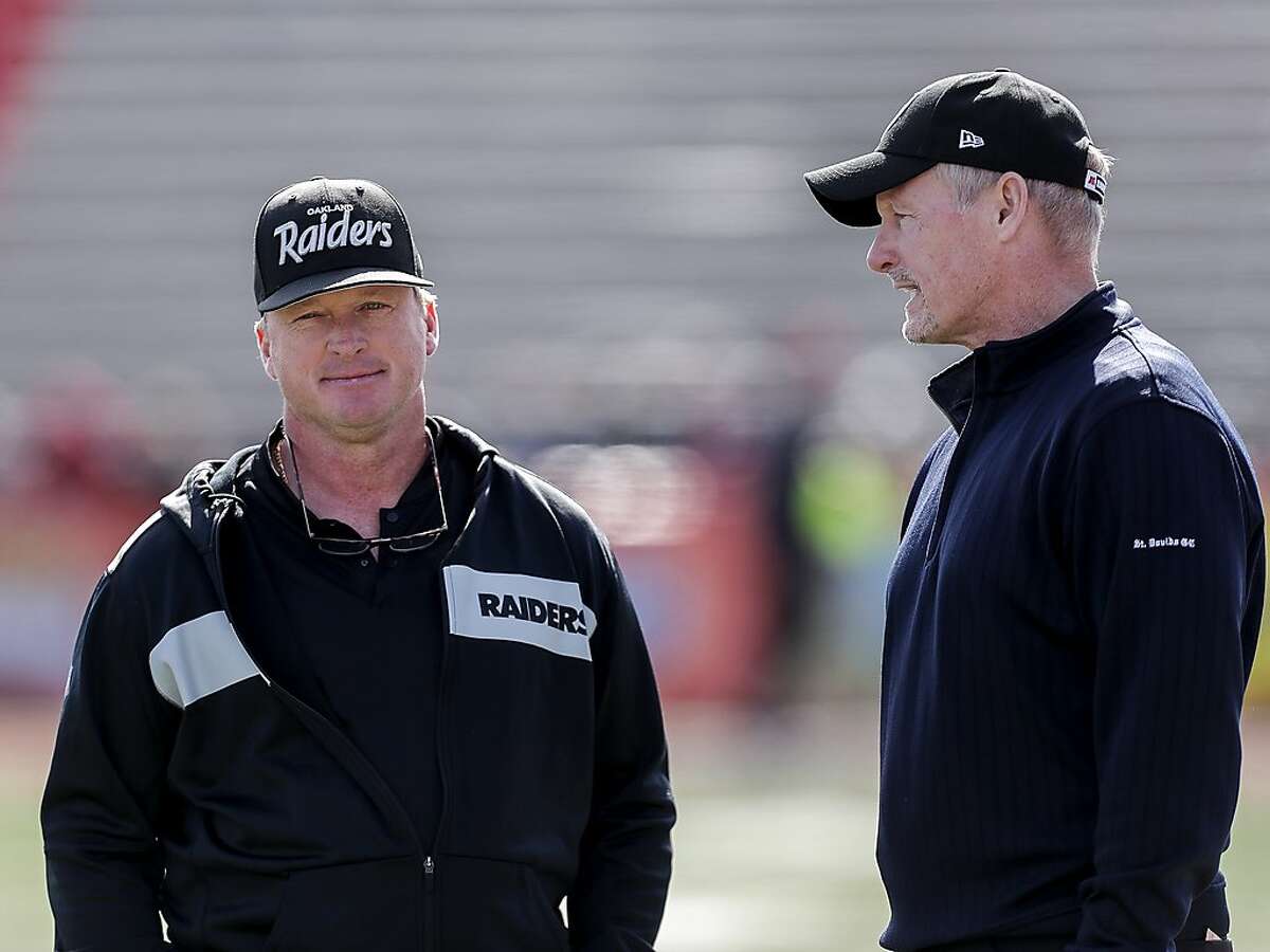 Raiders general manager Mike Mayock (right) is handing head coach Jon Gruden a remade offensive line this season.