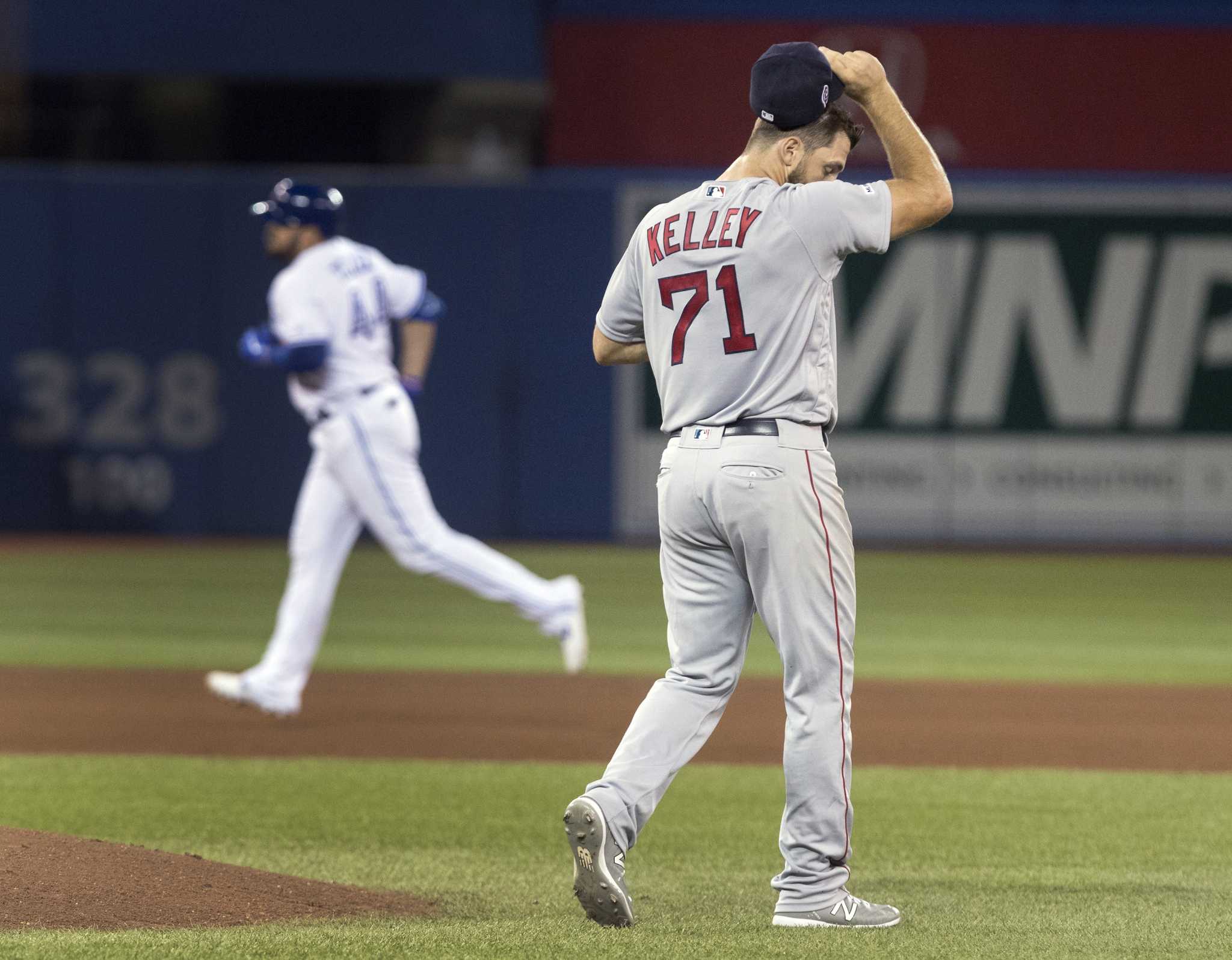 Biggio hit by pitch to force in tiebreaking run in 8th, Blue Jays