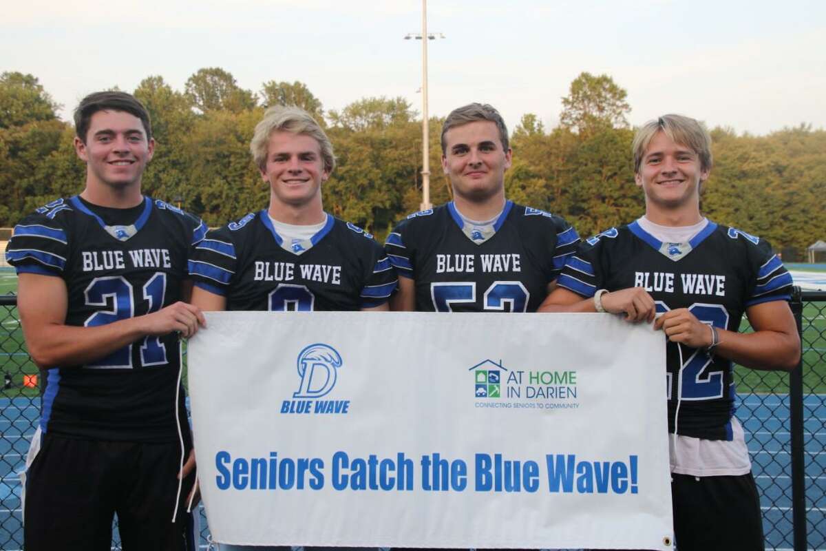 Darien Blue Wave football captains, from left, Will Kirby, Sam Wilson, Will Bothwell and John Henry Slonieski.
