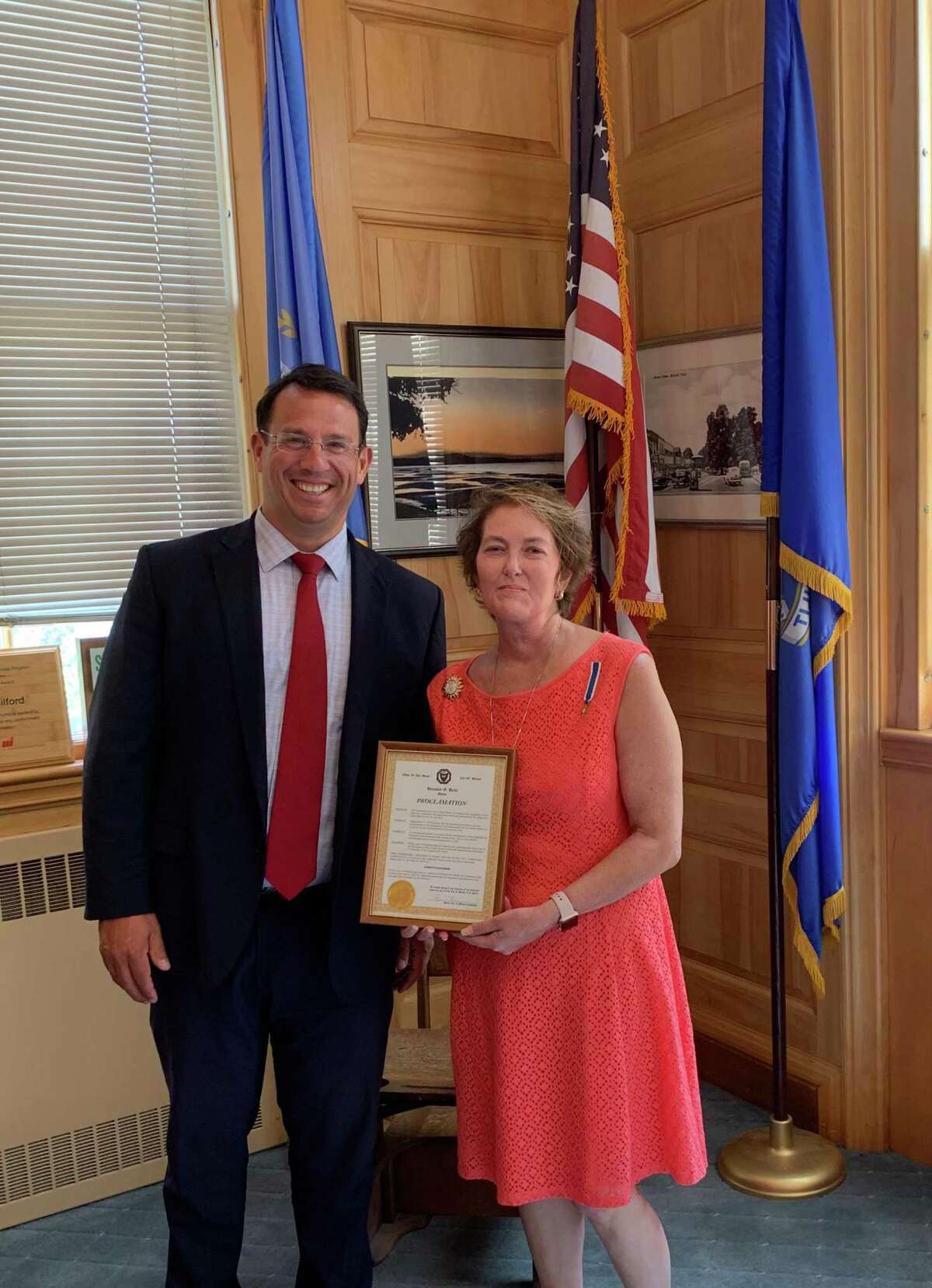 Mayor Ben Blake presented Regent Kendra Davis with a proclamation recently at Milford City Hall.