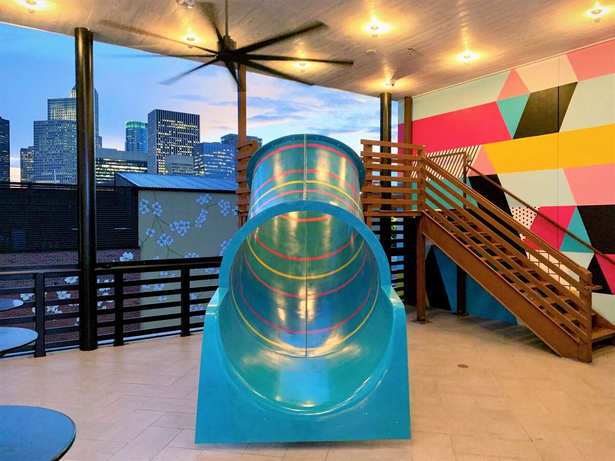 Electric Feelgood, a twostory bar with an indoor slide, is now open in Midtown