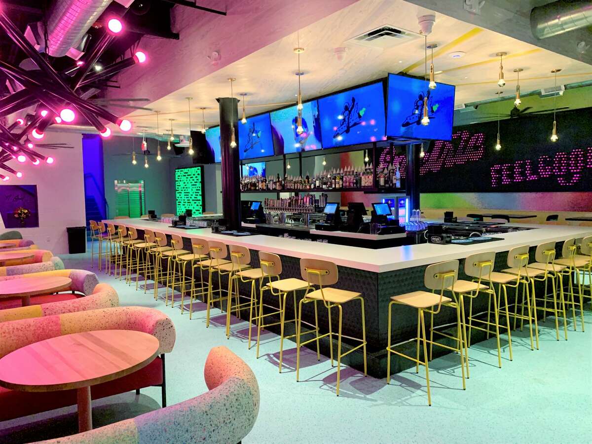 Electric Feelgood, a twostory bar with an indoor slide, is now open in Midtown