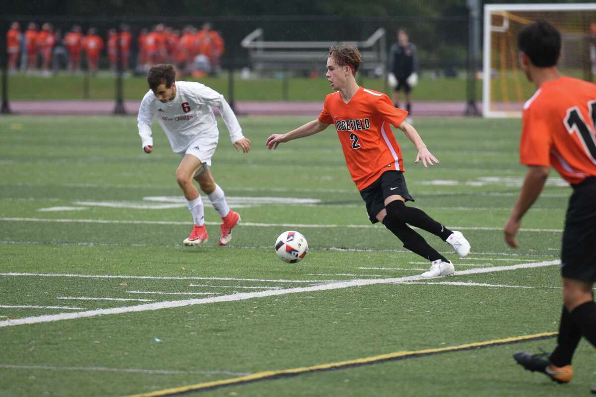 Ben Ragland, right, is one of the few returning starters for the RHS boys soccer team.