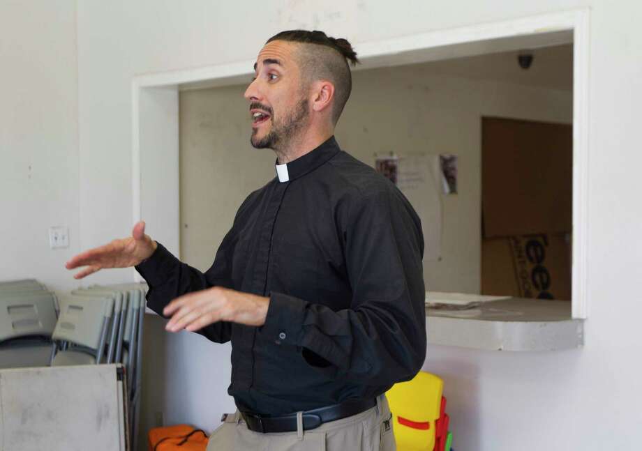 Sean Steele, reverend of St. Isidore Episcopal Church, gives a tour of the church’s food pantry and event space the organization is renovating from a former industrial space, Wednesday, Sept. 11, 2019, in Spring. Photo: Jason Fochtman, Houston Chronicle / Staff Photographer / Houston Chronicle