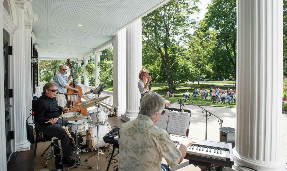 The Brian Butler Quartet performed at the Lounsbury House in Ridgefield, Connecticut on Sunday, September 8, 2019 as part of the Ridgefield Jazz, Funk and Blues Weekend. Brian Butler plays drums for the crowd as Eric Van Laer is on bass, Bill Lance on keyboard and Noreen Mola sings. The Brian Butler Quartet performed at the Lounsbury House in Ridgefield, Connecticut on Sunday, September 8, 2019 as part of the Ridgefield Jazz, Funk and Blues Weekend. Brian Butler plays drums for the crowd as Eric Van Laer is on bass, Bill Lance on keyboard and Noreen Mola sings.