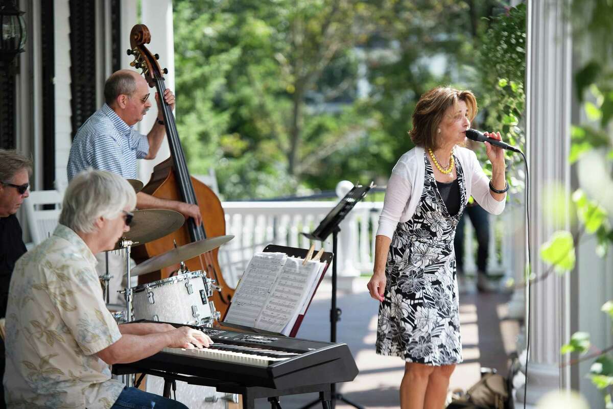 The Brian Butler Quartet performed at the Lounsbury House in Ridgefield, Connecticut on Sunday, September 8, 2019 as part of the Ridgefield Jazz, Funk and Blues Weekend. Brian Butler plays drums for the crowd as Eric Van Laer is on bass, Bill Lance on keyboard and Noreen Mola sings. The Brian Butler Quartet performed at the Lounsbury House in Ridgefield, Connecticut on Sunday, September 8, 2019 as part of the Ridgefield Jazz, Funk and Blues Weekend. Brian Butler plays drums for the crowd as Eric Van Laer is on bass, Bill Lance on keyboard and Noreen Mola sings.