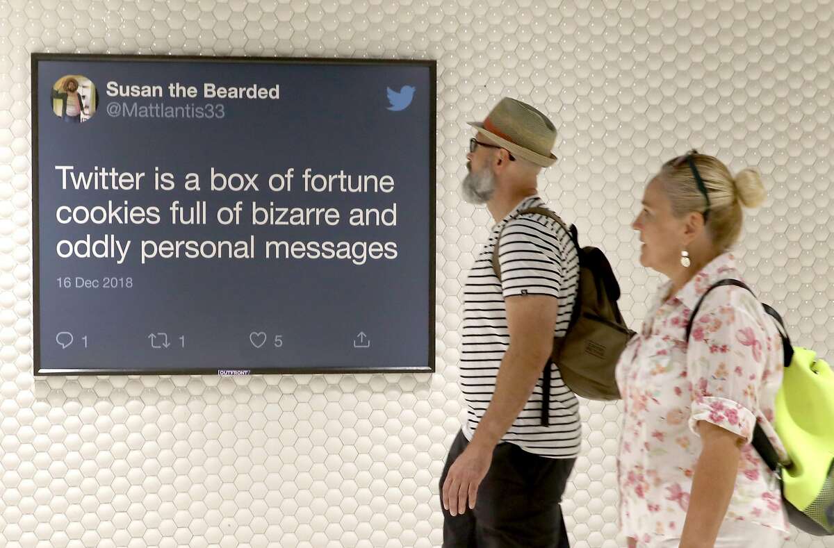 Tweets are displayed on Twitter billboard ads inside Powell Street station on Thursday, Sept. 12, 2019 in San Francisco, Calif.