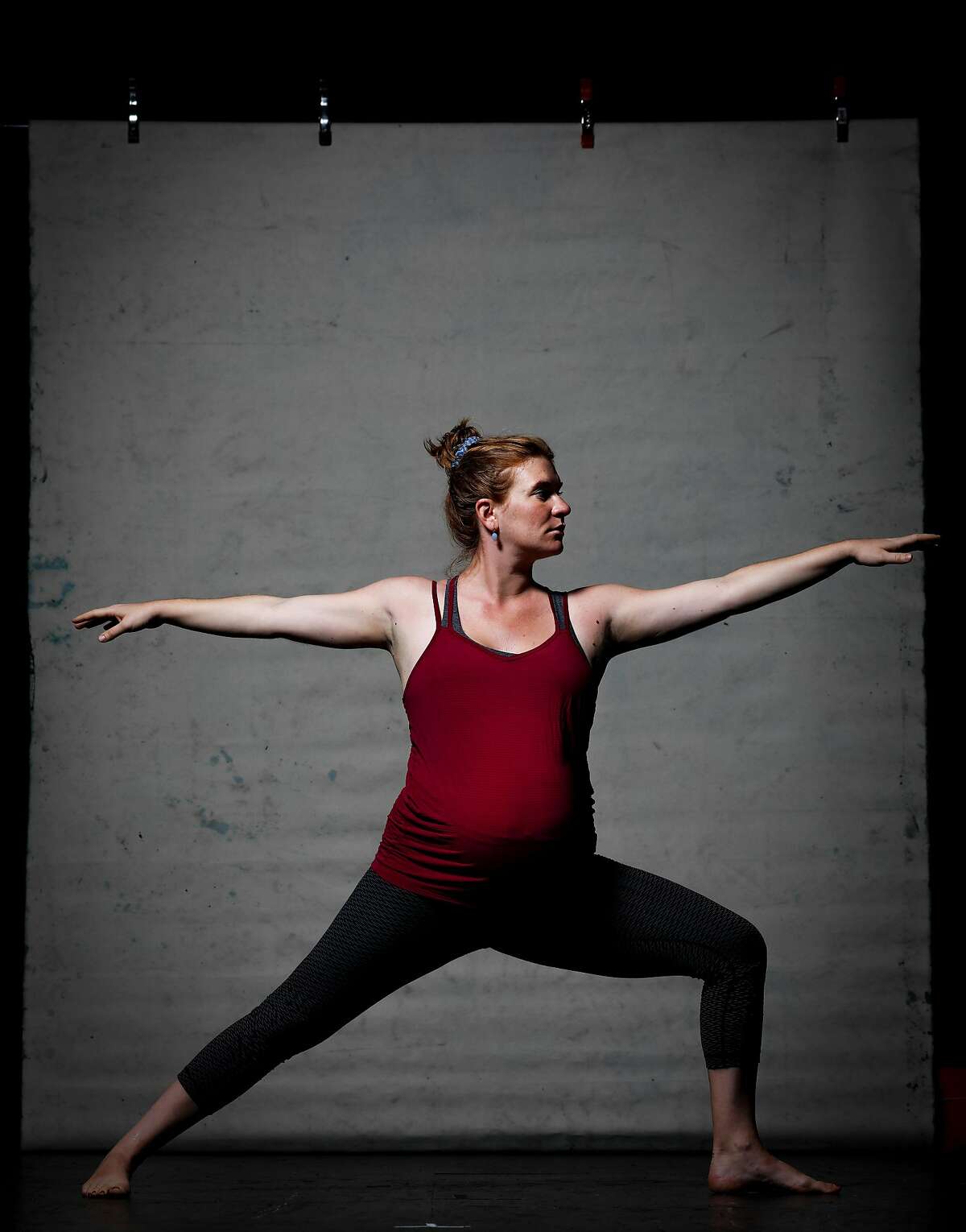 Charlotte Bruce-Byrne, who has been practicing yoga at Yoga Tree with Jane Austin, strikes the extended side angle pose on Thursday, Sept. 12, 2019 in San Francisco, Calif.