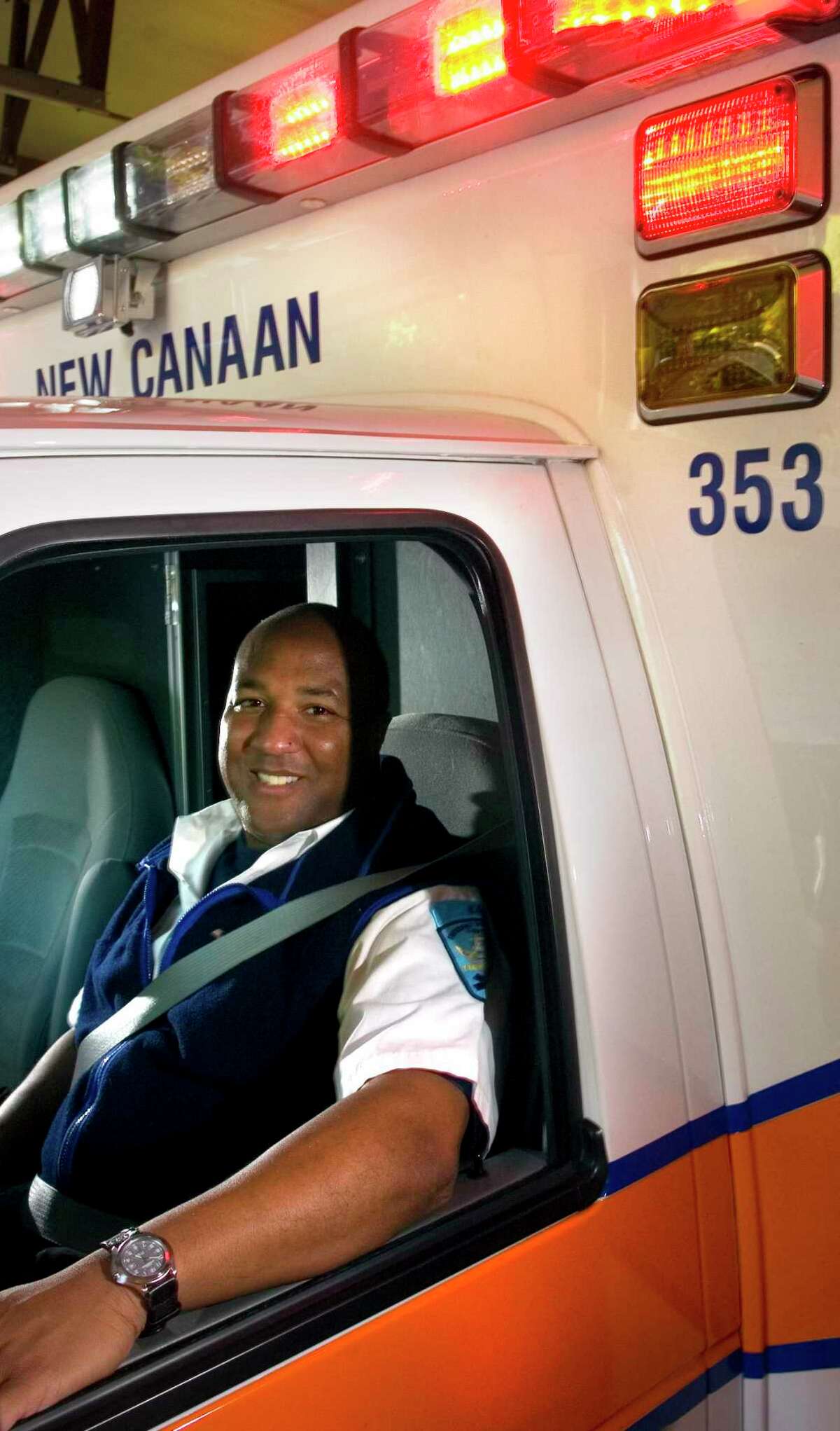 Pictured is New Canaan Emergency Medical Services and New Canaan Volunteer Ambulance Corp member Troy Haynie in one of the organizations’ emergency vehicles, an ambulance. An open house will be held this coming Sunday, Sept, 15, 2019 from 11 a.m. to 1 p.m. at their building, which is located at 182 South Ave. and very close to the center of town. Andrew Sullivan / Staff photo