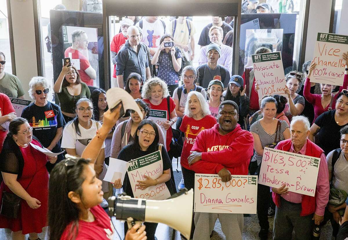Students and faculty demonstrators chant as they gather inside Conlan Hall to protest large executive raises amidst class cuts at City College of San Francisco's Conlan Hall in San Francisco, Calif. Thursday, September 12, 2019.