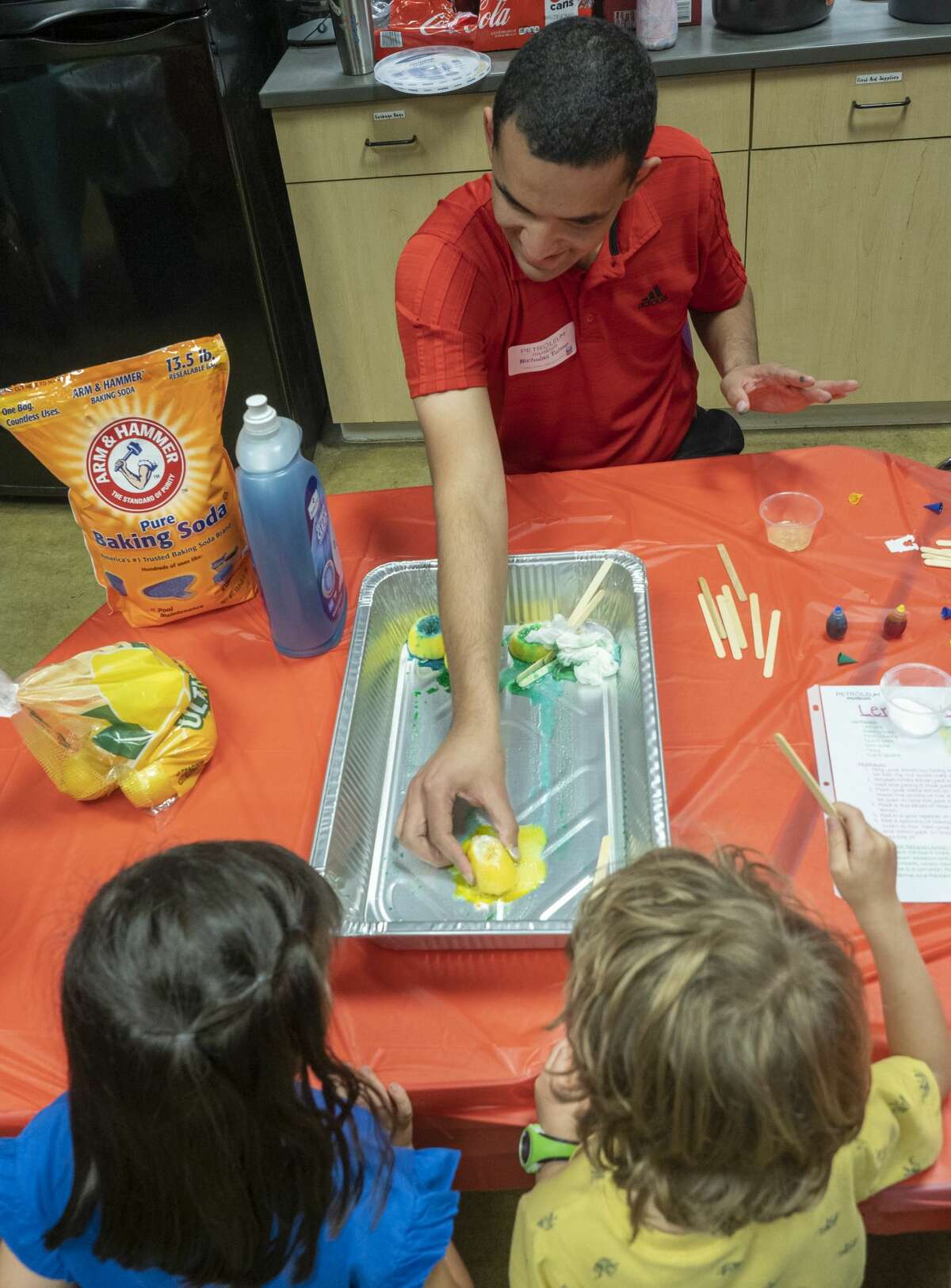 Nicholas Toliver demonstrates making a volcano with lemon juice and baking soda 09/12/19 evening at Family Science Night at the Petroleum Museum. Tim Fischer/Reporter-Telegram