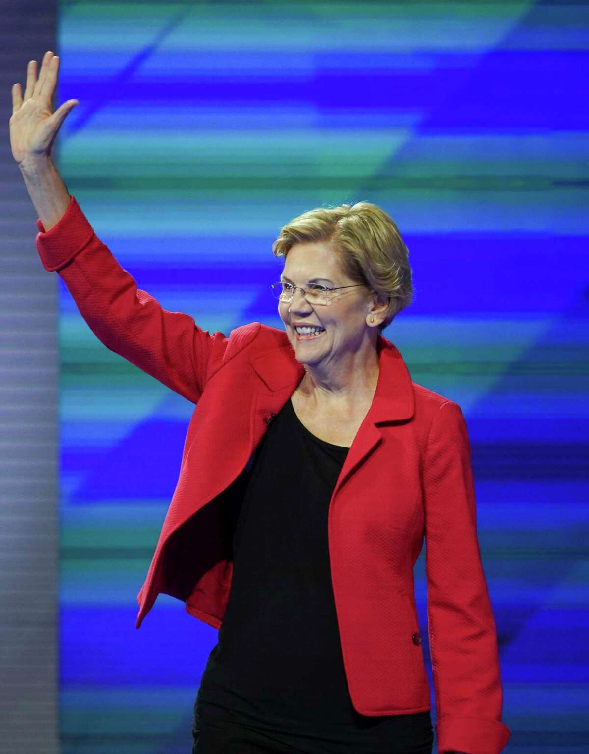 Democratic presidential candidate Sen. Elizabeth Warren, D-Mass., takes the stage for the Democratic Debate at Texas Southern University's Health & Physical Education Center Thursday, Sept. 12, 2019, in Houston.