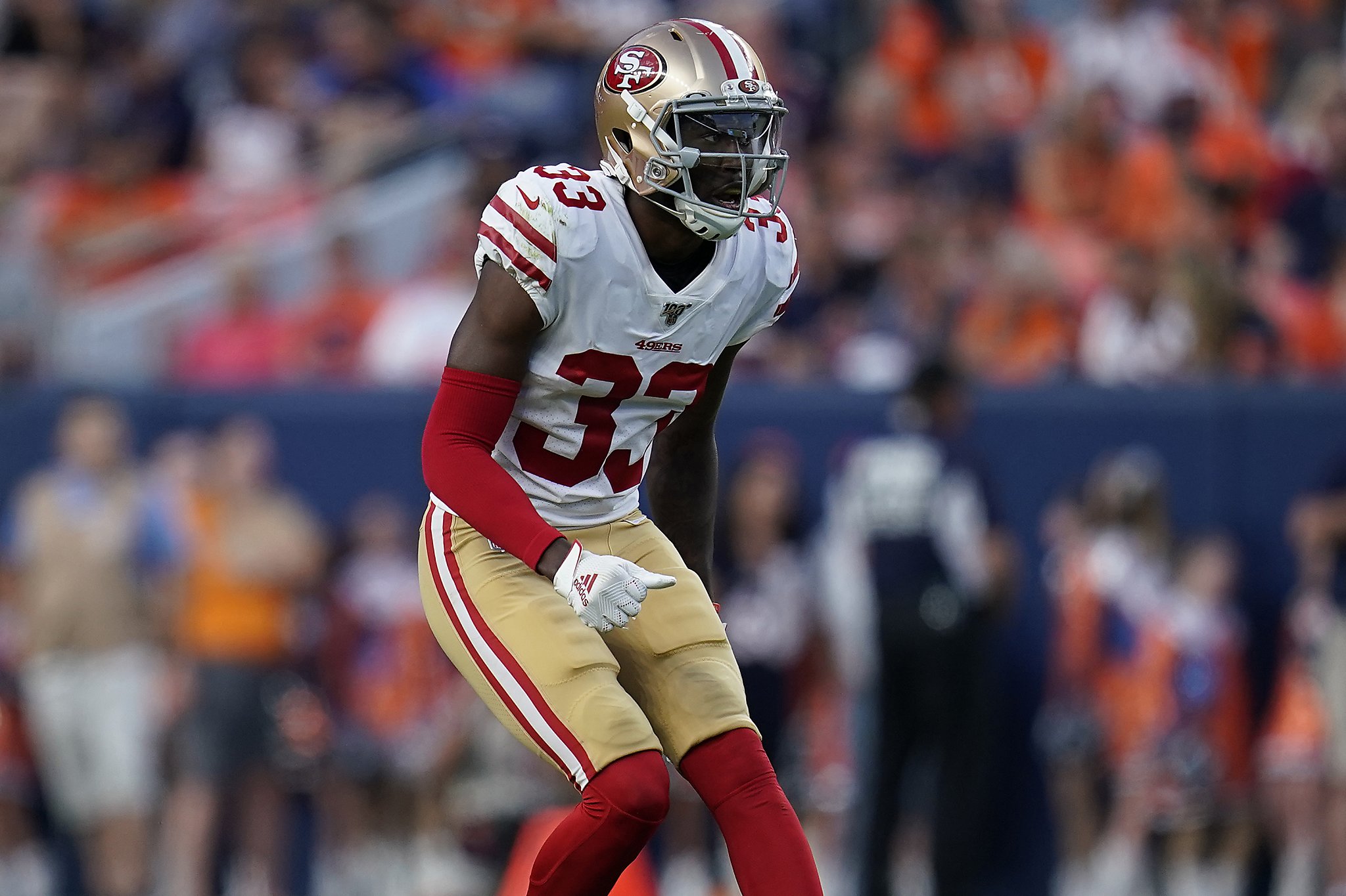 San Francisco 49ers safety Tarvarius Moore, left, and linebacker