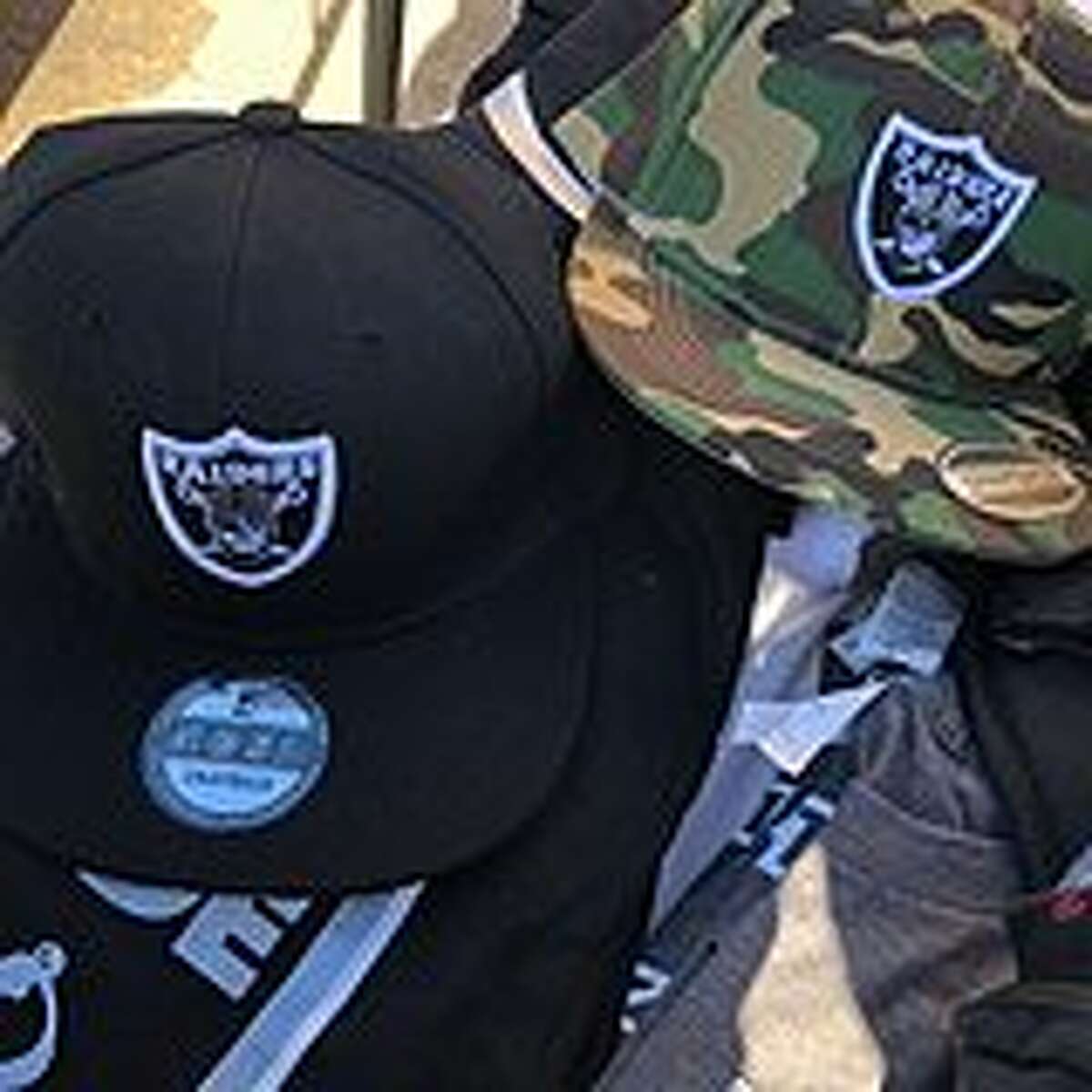 ICE agents raided last week's Raiders game, finding $11,000 in unauthorized NFL merchandise.