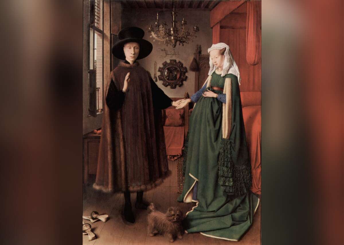Arnolfini Portrait - Artist: Jan van Eyck - Year: 1434 Painted by Dutch master Jan van Eyck, this early Netherlandish panel painting is shrouded in symbolism. The elegantly dressed couple are thought to be Giovanni di Nicolao di Arnolfini, and his wife, Costanza Trenta, wealthy Italians living in Bruges. The unusual composition begs several questions. Does the painting celebrate the couple’s wedding, or commemorate some other event, such as a shrewdly negotiated marriage contract? Was the bride pregnant, or simply dressed in the latest fashion? And what are the mysterious figures depicted in the convex mirror? The unorthodox placement of van Eyck’s signature directly above it suggests one of the men may be the artist himself.