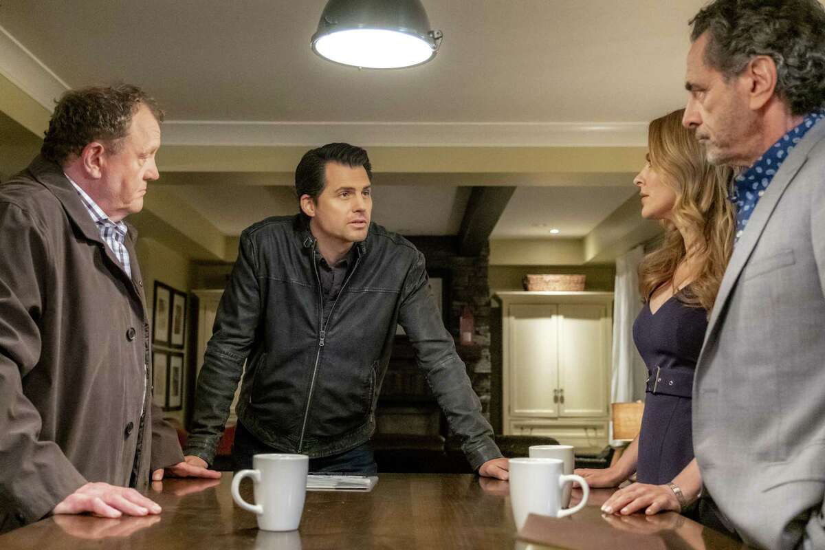 Mystery 101: Words Can Kill: When a guest at the college book festival is killed, Amy and Travis clash after he arrests an unlikely person for murder. Amy must fight to prove heas got the wrong person behind bars. Photo: Eric Keenleyside, Kristoffer Polaha, Jill Wagner, Robin Thomas Credit: (c)2019 Crown Media United States LLC/Photographer: Kailey Schwerman