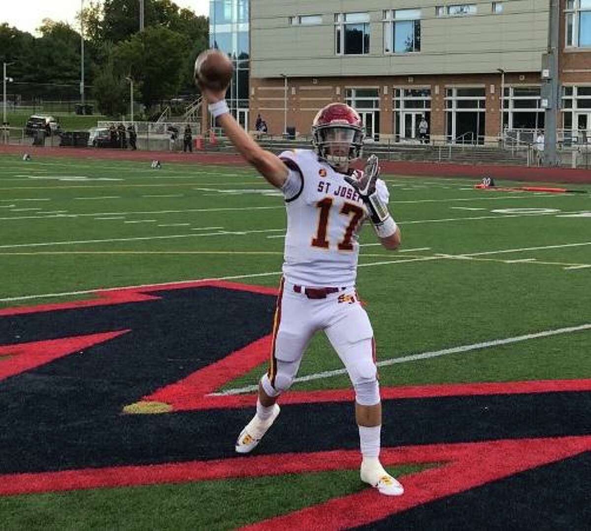 Jack Wallace threw for five touchdowns in his first varsity start at quarterback for St. Joseph on Friday.