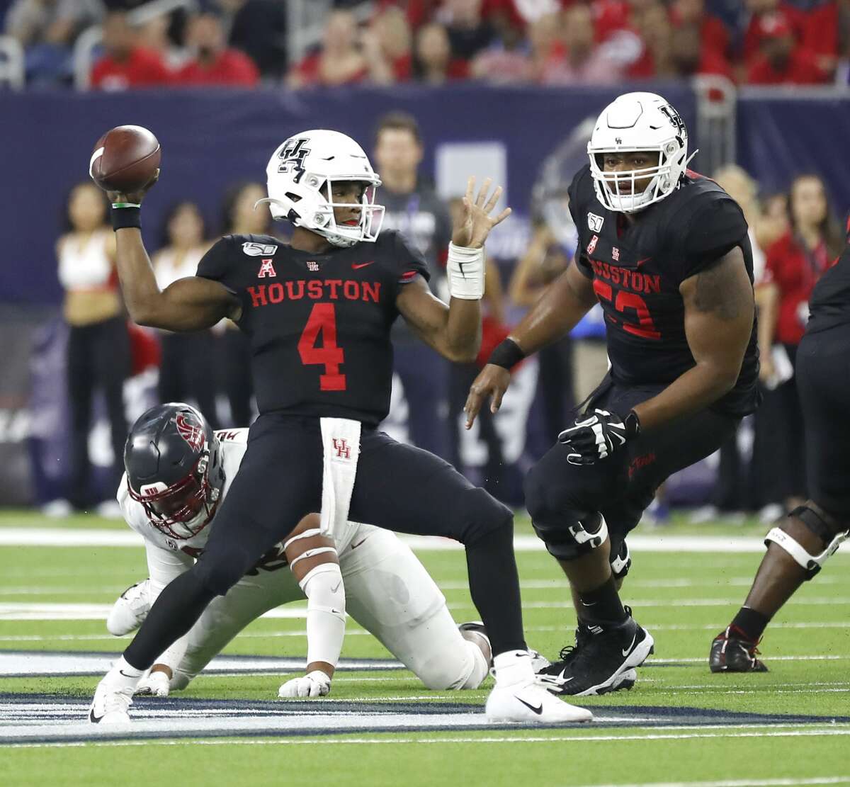 PHOTOS: UH vs. Washington State  Houston Cougars quarterback D'Eriq King (4) looks to pass the ball in the first half of the AdvoCare Texas Kickoff game at NRG Stadium, Friday, Sept. 13, 2019, in Houston. >>>See photos from the Cougars' Week 2 game ... 