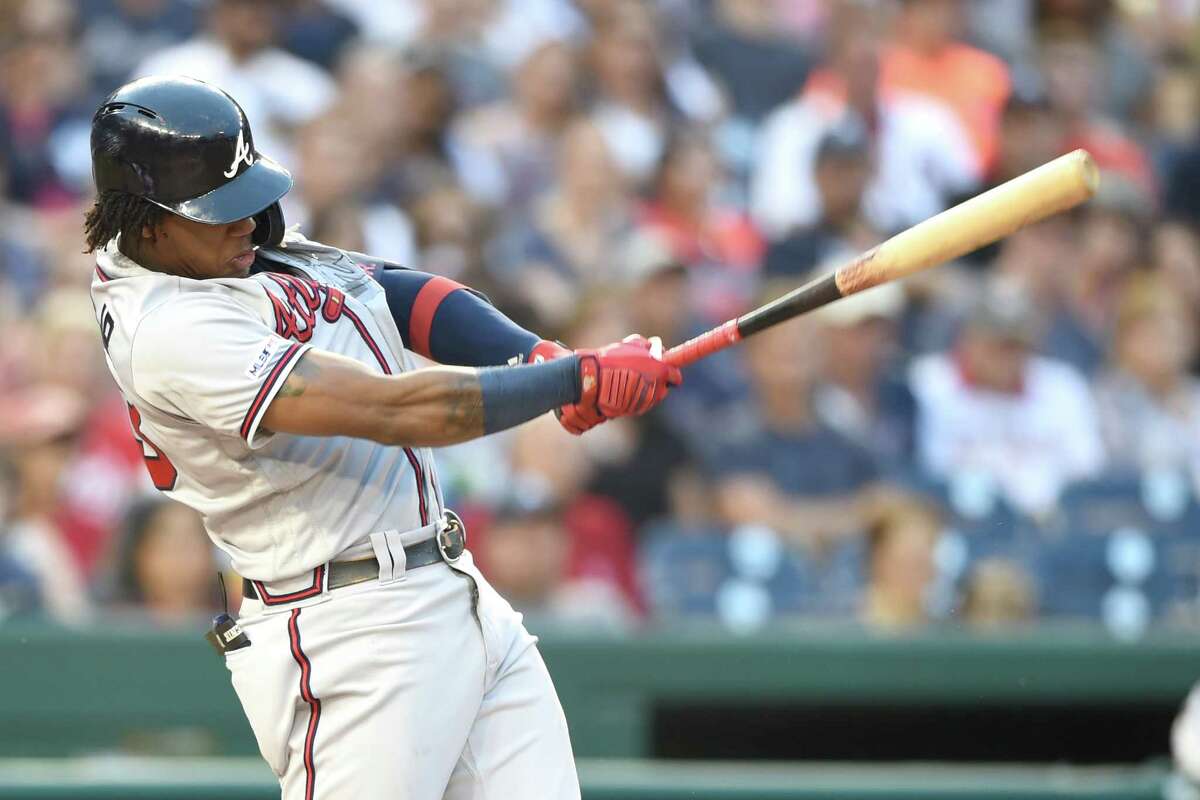 Braves first MLB team to clinch playoff berth this year, rally to