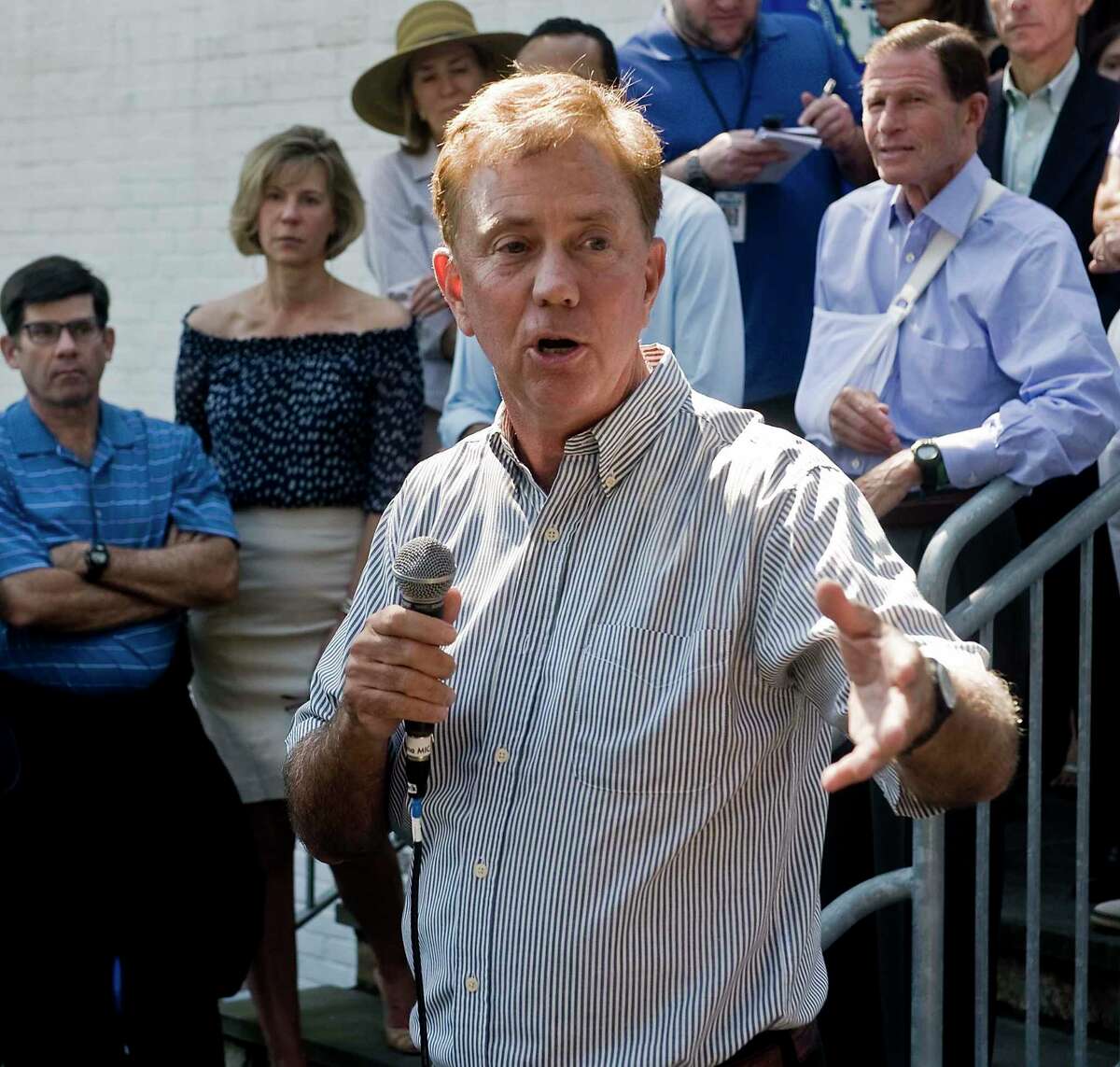 Connecticut Governor Ned Lamont addresses the gathering at the Greenwich Democratic Town Committee's annual picnic at the Greenwich Botanical Center, Sunday, Sept. 15, 2019