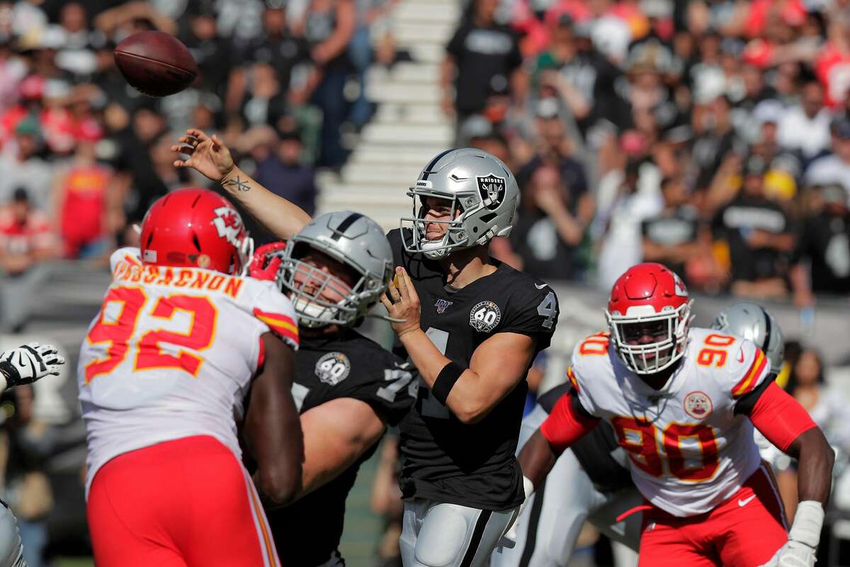 Derek Carr (4) passes in the second half as the Oakland Raiders play the Kansas City Chiefs in the coliseum in Oakland, Calif., on Sunday, September 15, 2019.