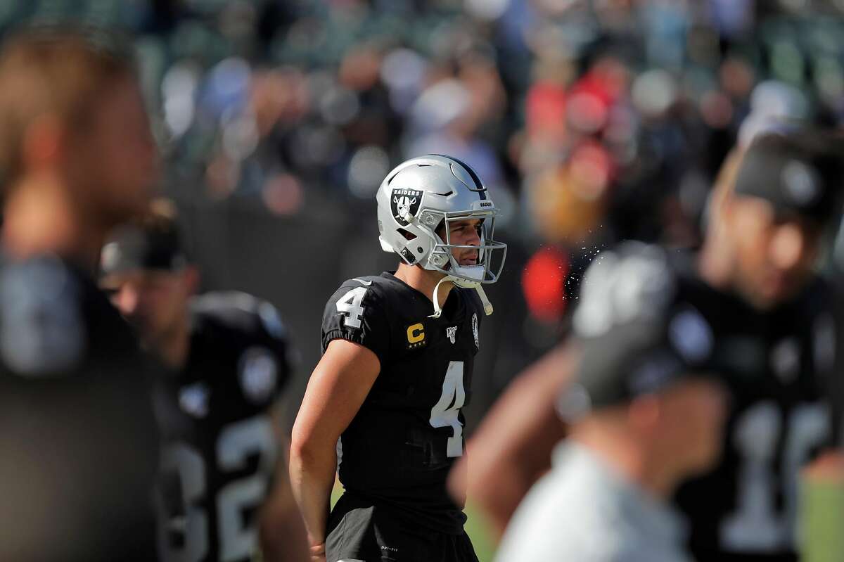 Derek Carr (4) on the sidelines in the final seconds of the second half as the Oakland Raiders play the Kansas City Chiefs in the coliseum in Oakland, Calif., on Sunday, September 15, 2019.