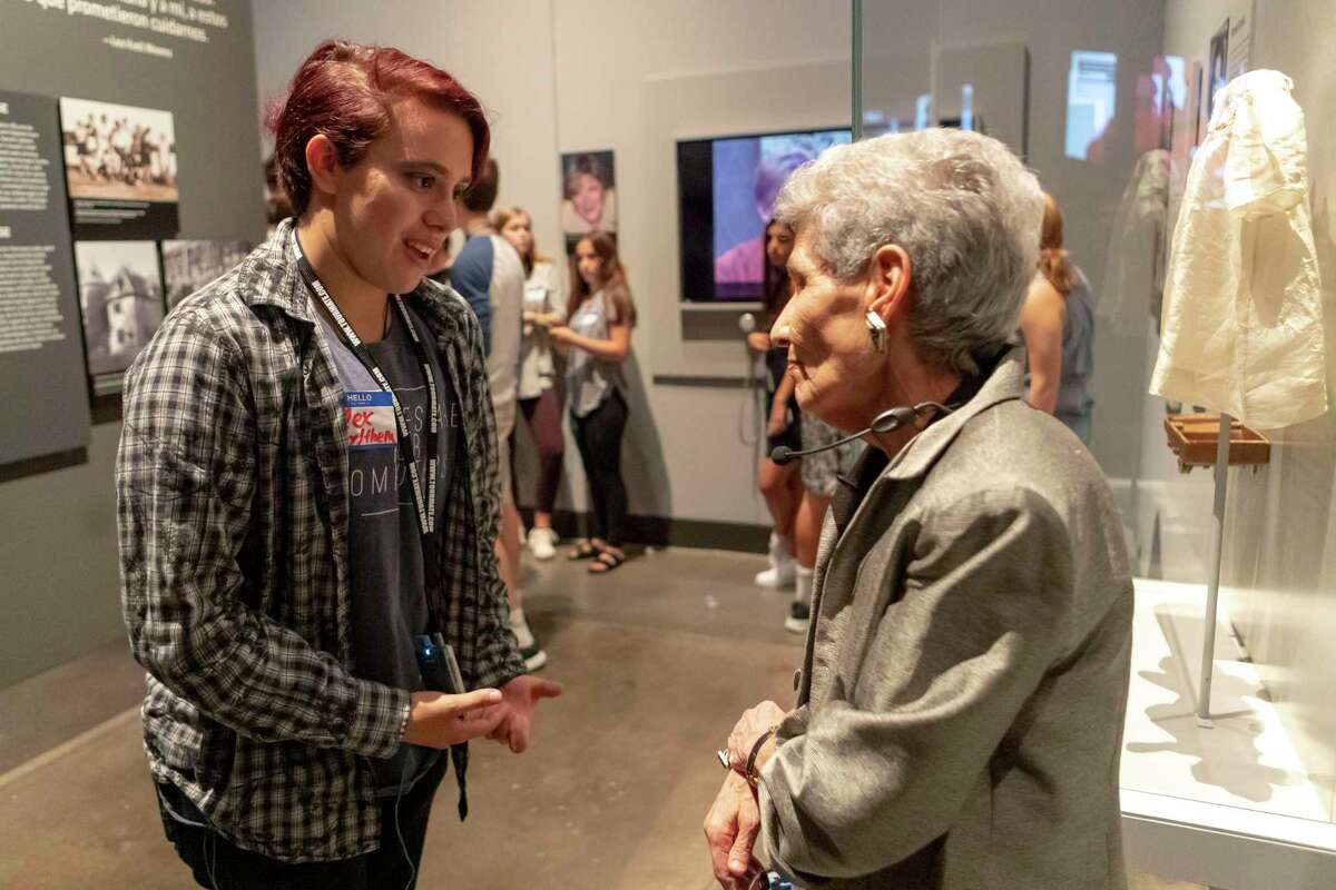 Holocaust survivor Chaja Verveer of Houston, speaks with Alex Lewis a local student apart of the Engines of Change student ambassador program at the Holocaust Museum Houston Sunday, Sep 15, 2019, in Houston.