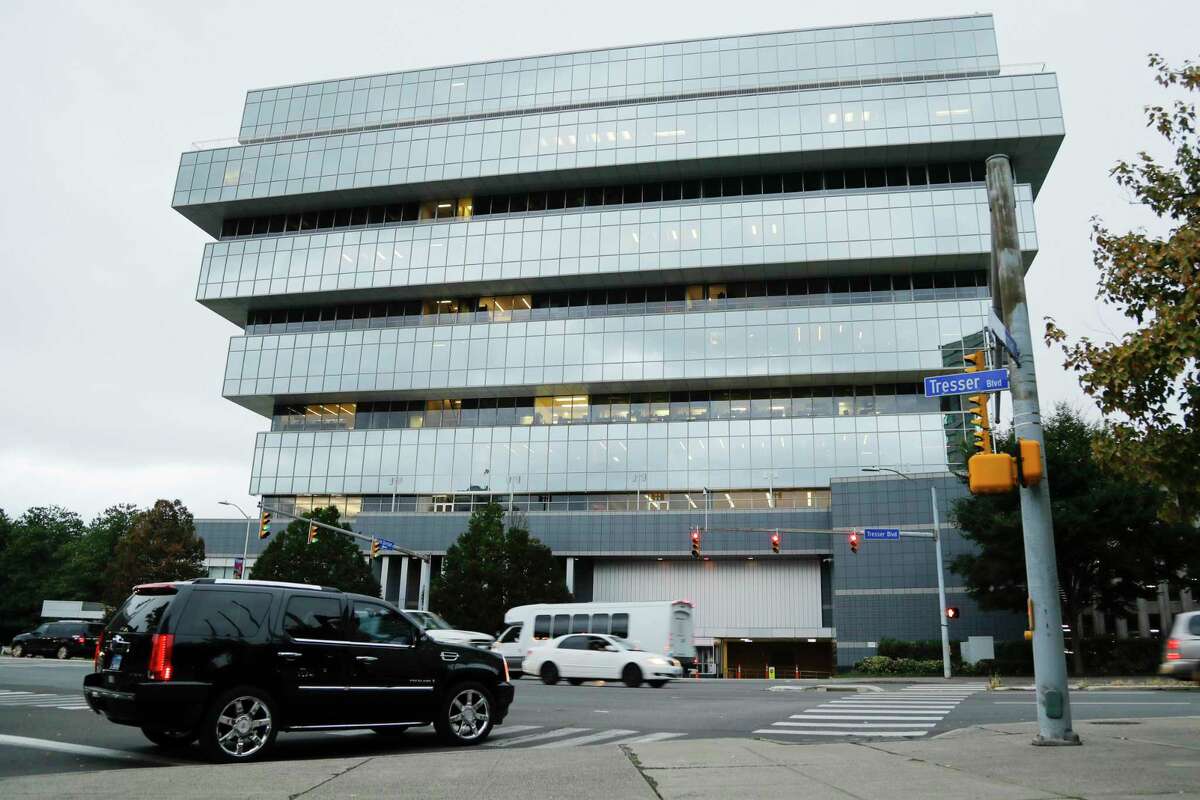 FILE - In this Sept. 12, 2019, file photo, cars pass Purdue Pharma headquarters in Stamford, Conn. The company, which makes OxyContin and other drugs, filed court papers in New York on Sunday, Sept. 15 seeking Chapter 11 bankruptcy protection. (AP Photo/Frank Franklin II, File)