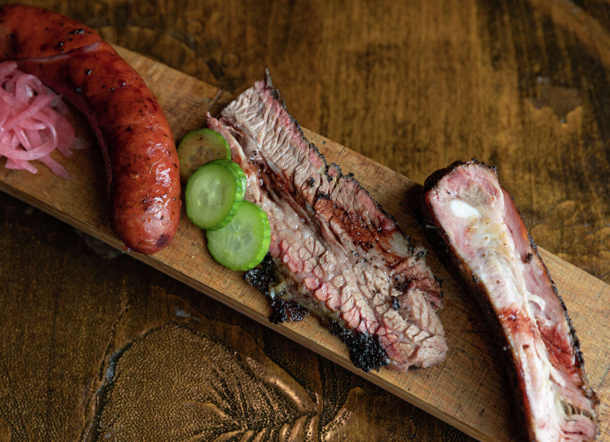 The fifth annual Houston BBQ Throwdown will be held on Sept. 29. Shown: Brisket, smoked sausage, pork ribs and pomegranate reduction from Harlem Road Texas BBQ.