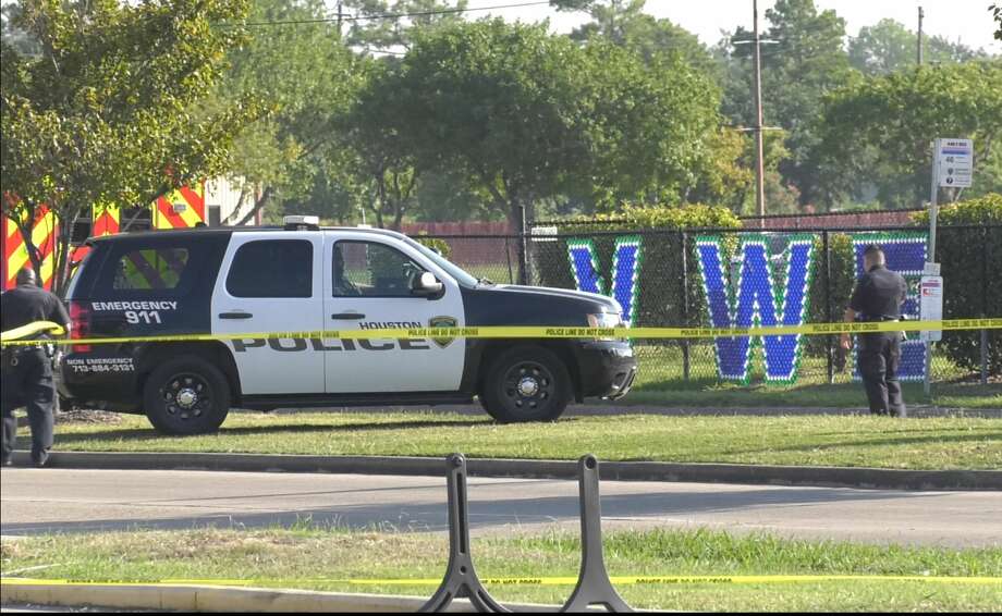 Houston police say officer kills armed man outside elementary school ...