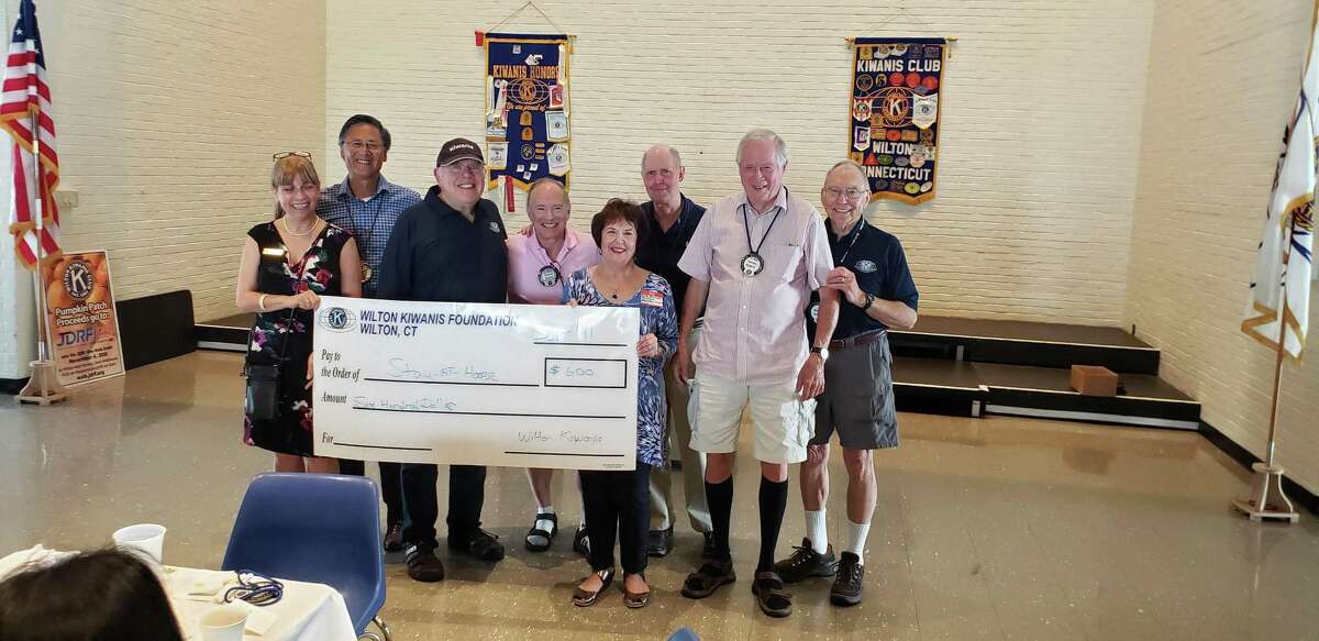 At its meeting on Sept. 11, the Wilton Kiwanis Club made a donation to Stay at Home in Wilton to be used for a scholarship to financially assist people who would like to join the organization. From left are MaryAnne Franco, Stay at Home president Sally Kirmser, Larry Mauer, Gordon Nugent and Dave Hapke.