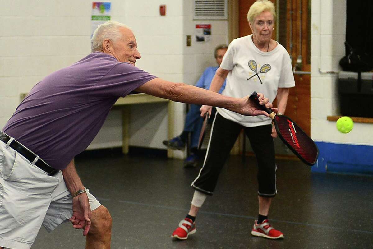 Richard Nichols and Mary Holland play Pickleball Tuesday, June 25, 2019, at the Norwalk Senior Center.