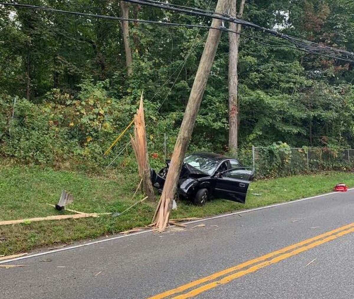 Southbury police investigate car vs. pole crash