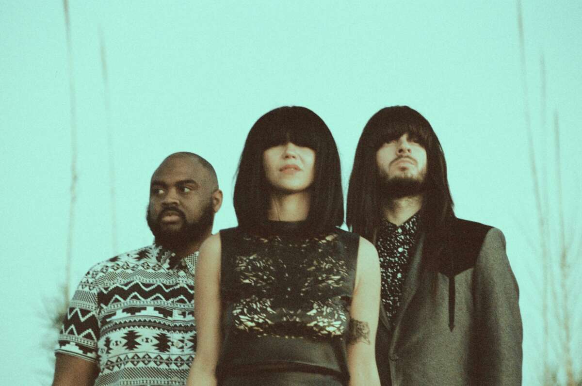 Texas trio Khruangbin is Laura Lee on bass, Mark Speer on guitar, and Donald “DJ” Johnson on drums.