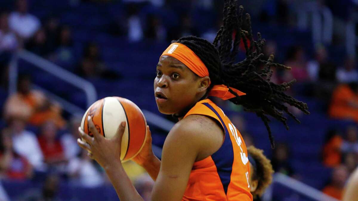 Connecticut Sun forward Jonquel Jones grabs a rebound against the Phoenix Mercury during the second half of a WNBA basketball game Wednesday, Aug. 14, 2019, in Phoenix.