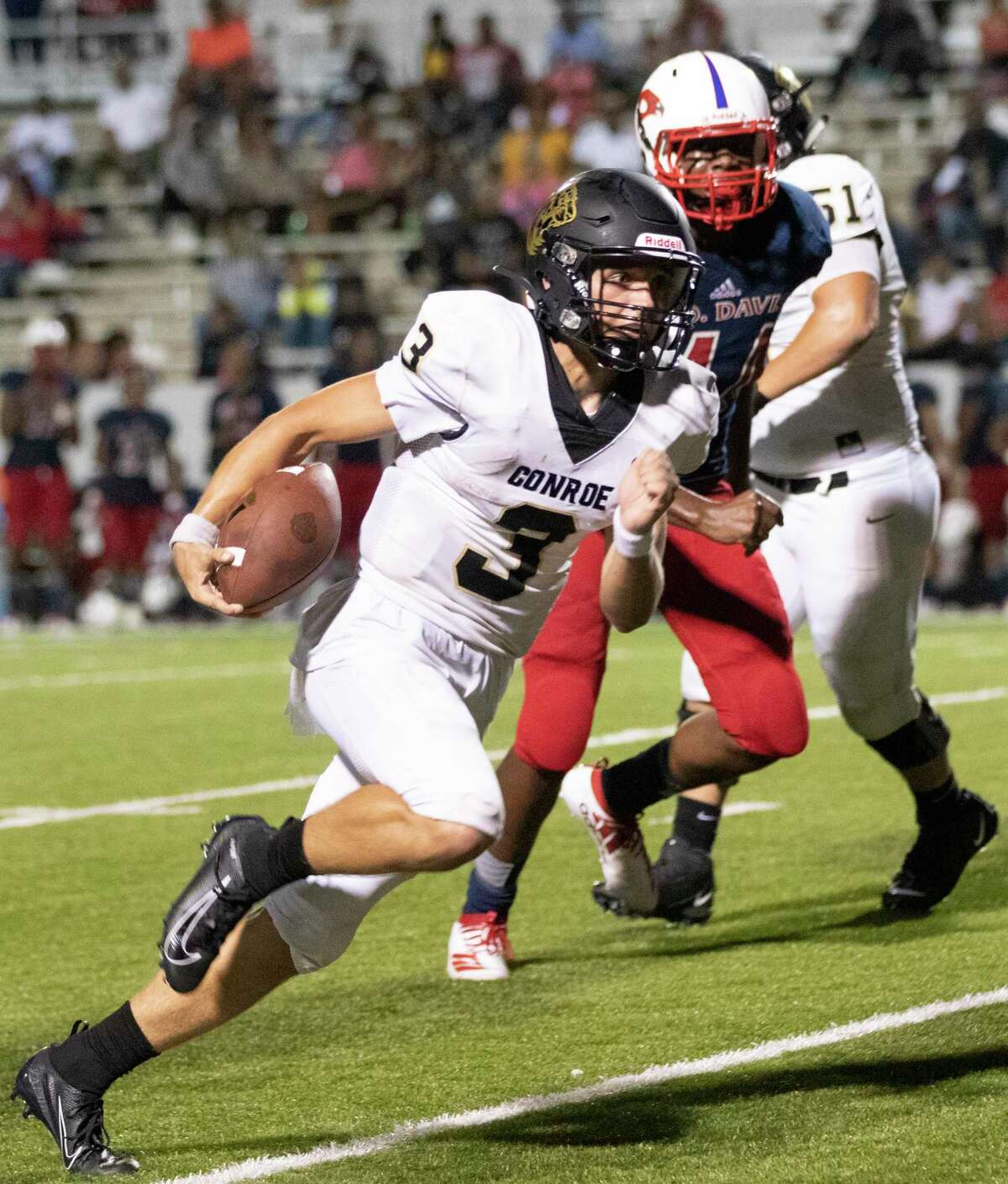 Conroe quarterback Christian Pack is currently the District 15-6A passing leader, but he also ranked fifth in rushing yards.