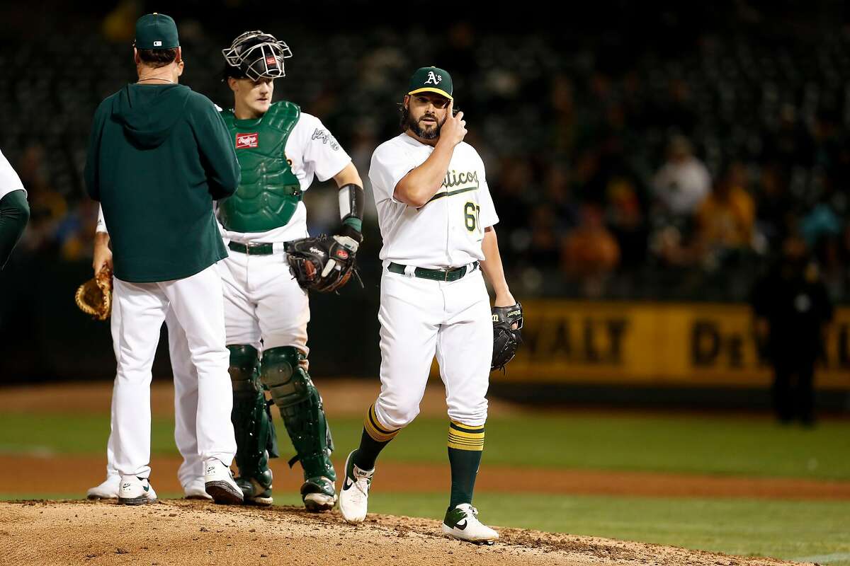 Oakland Athletics' starting pitcher Tanner Roark is removed in 5th inning against Kansas City Royals during MLB game at Oakland Coliseum in Oakland, Calif., on Monday, September 16, 2019.