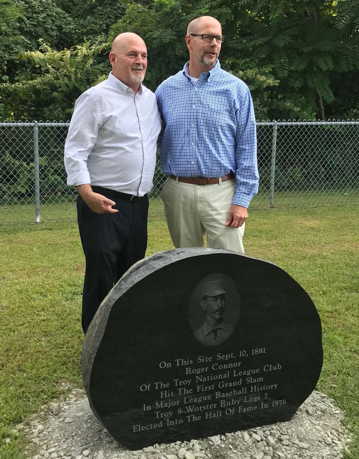 Rensselaer Mayor Rich Mooney, right, and councilman Bryan Leahey savored the moment of unveiling the Roger Connor monument 138 years to the day after the slugger hit the first grand slam in Major League Baseball history (Paul Grondahl / Times Union)